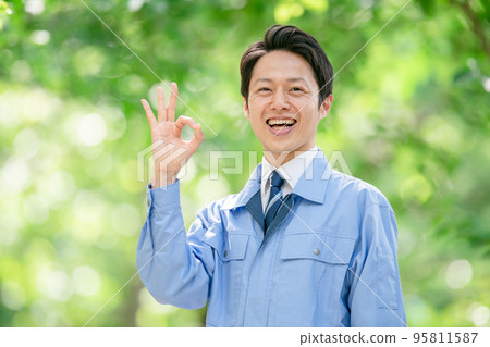 Men in work clothes, outdoors, fresh greenery, real estate, construction OK 95811587