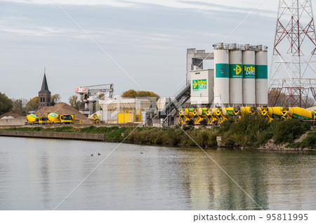 Zemst, Flemish Brabant Region, Belgium  - The Inter Beton cement group with industrial activity at the banks of the canal 95811995