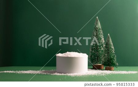 Minimalistic festive empty scene showcase for product, green background, tree Christmas toys, snow Minimalistic festive empty scene showcase for product, green background, tree Christmas toys, snow 95815333