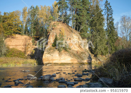 Zvartes cliff on river Amata, Latvia with sky. Zvartes cliff on river Amata, Latvia with sky. 95815970