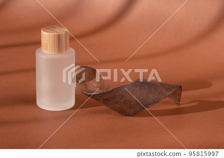 Cream beauty skincare cosmetic mockup showcase, shadow from sun. Product presentation, cosmetics brand, lotion, peptide, collagen, hyaluronic acid in glass bottle, wooden decor. Minimal 95815997