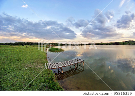 Lake, wood bridge, sunset Lake, wood bridge, sunset 95816339