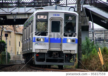 "10000 series" commuter train runs fast... Tobu Urban Park Line "10000 series" commuter train runs fast... Tobu Urban Park Line 95817559