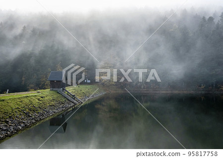 Water reservoir Klinger in Stiavnica Mountains, Slovakia, seasonal natural scene Water reservoir Klinger in Stiavnica Mountains, Slovakia, seasonal natural scene 95817758