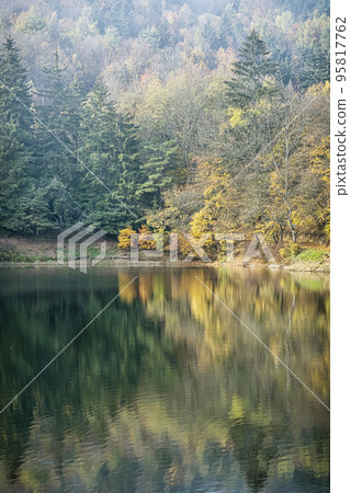 Water reservoir Klinger in Stiavnica Mountains, Slovakia, seasonal natural scene Water reservoir Klinger in Stiavnica Mountains, Slovakia, seasonal natural scene 95817762