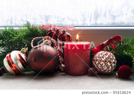 Christmas decorations on windowsil 95818624
