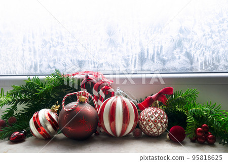 Christmas decorations on windowsil 95818625