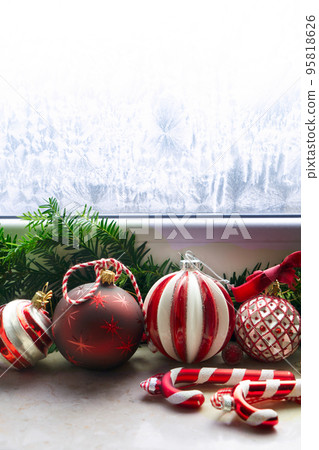 Christmas decorations on windowsil 95818626