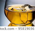 Glass of whisky on the rocks 95819036