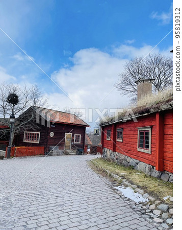 View of a farmhouse in the skansen museum in Stockholm. 95819312
