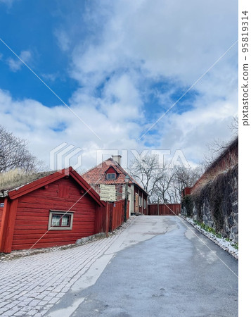 View of a farmhouse in the skansen museum in Stockholm. 95819314