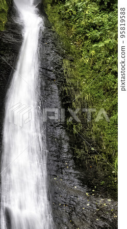 Whitelady waterfall in rain - Lydford Gorge, Dartmoor National Park, Devon, United Kingdom 95819588