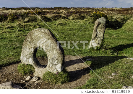 Men-an-Tol known as Men an Toll or Crick Stone - small formation of standing stones in Cornwall, United Kingdom Men-an-Tol known as Men an Toll or Crick Stone - small formation of standing stones in Cornwall, United Kingdom 95819929