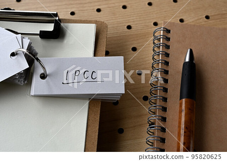 A word book and a clipboard with IPCC written on it 95820625