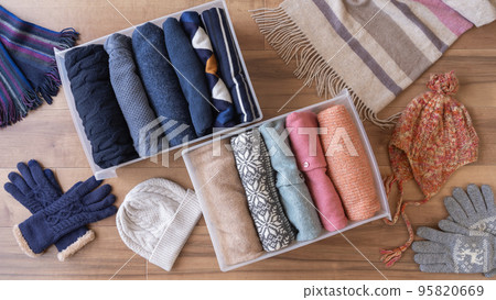 Organizing winter clothes | Image of changing clothes Organizing winter clothes | Image of changing clothes 95820669
