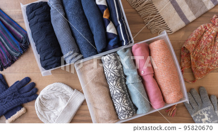 Organizing winter clothes | Image of changing clothes 95820670