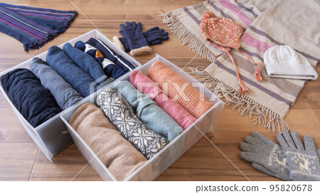Organizing winter clothes | Image of changing clothes Organizing winter clothes | Image of changing clothes 95820678