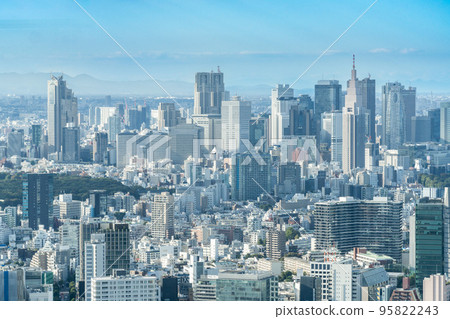 Tokyo cityscape with Shinjuku buildings illuminated by gentle light 95822243