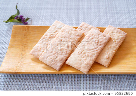 Simple thin baked Japanese confectionery made with buckwheat flour Simple thin baked Japanese confectionery made with buckwheat flour 95822690