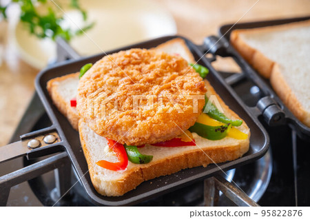 Bread with ham cutlet 95822876