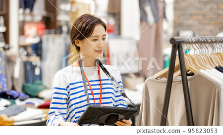 Female apparel store clerk 95823053