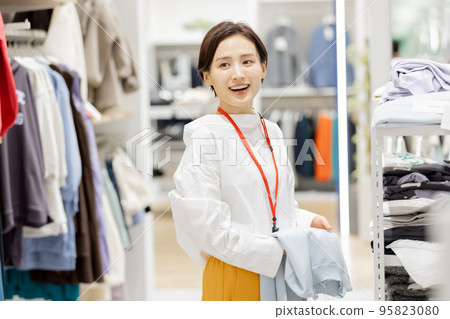 Female apparel store clerk 95823080