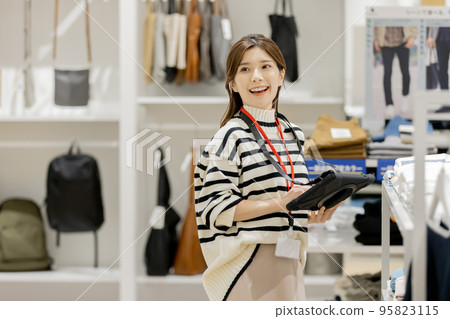Female apparel store clerk 95823115