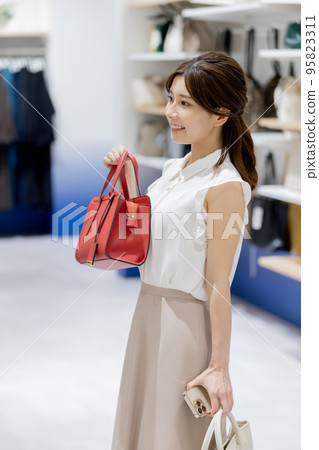 Female boutique shopping Female boutique shopping 95823311
