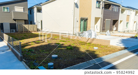 Clearing landscape of newly built residential area 95824992