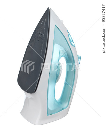 Toy iron of modern design with a switch of operating modes, in a standing position with a visible ironing surface, highlighted on a white background. Toy iron of modern design with a switch of operating modes, in a standing position with a visible ironing surface, highlighted on a white background. 95827417