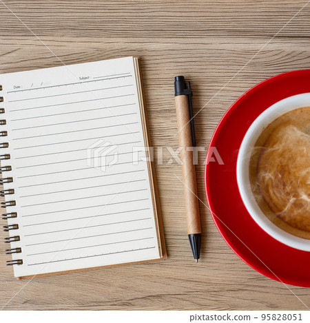 blank notebook and coffee cup on wood table. Motivation, Resolution, To do list, Strategy and Plan concept blank notebook and coffee cup on wood table. Motivation, Resolution, To do list, Strategy and Plan concept 95828051