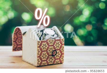 Coins in Treasure Chest And has an illustration of interest, Concept of saving for interest. Coins in Treasure Chest And has an illustration of interest, Concept of saving for interest. 95828653