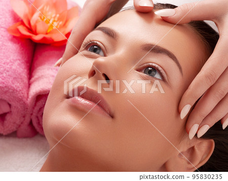 Young girl with thick eyebrows and perfect skin at 95830235