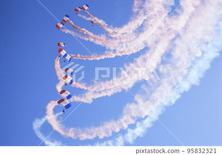 Colorful paramotors on blue sky Colorful paramotors on blue sky 95832321