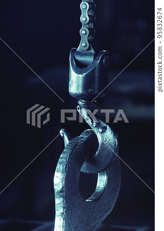 Crane hook on a black background. Crane hook on a black background. 95832674