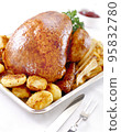 Whole roasted chicken with potatoes 95832780