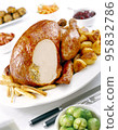 Roast chicken with potatoes 95832786
