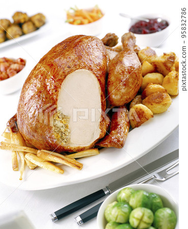 Roast chicken with potatoes Roast chicken with potatoes 95832786