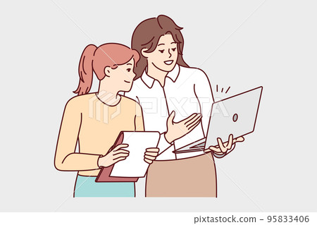 Businesswomen brainstorming working on laptop  95833406