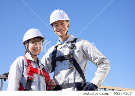 Worker wearing full harness Work at height Construction site Image 95834107