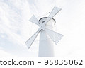 Close-up of old windmill lighthouse in Swinoujscie, a port in Poland on the Baltic Sea. High key 95835062