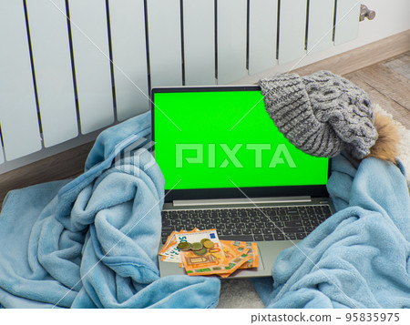 Laptop near the battery Laptop near the battery 95835975
