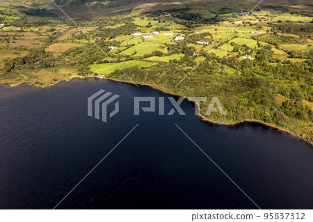 Aerial view of The Lake Eske in Donegal, Ireland. 95837312