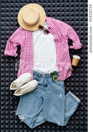 Casual clothes jeans, shirt, shoes on gray background top view 95839729