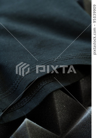 Black plain cotton t-shirt sleeve close up 95839909