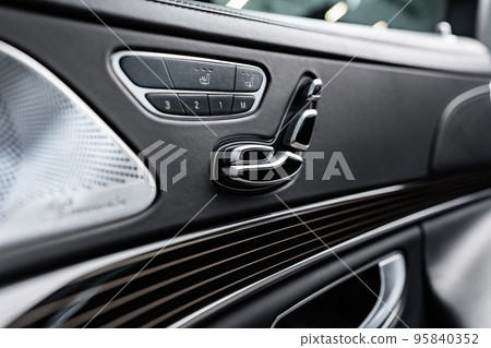 Car door inside the luxury modern car close up 95840352