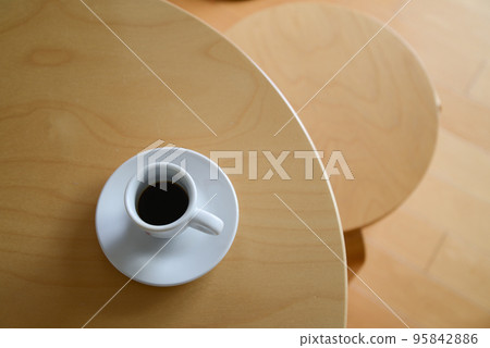 Coffee cup placed on the table Coffee cup placed on the table 95842886