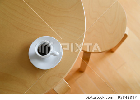 Coffee cup placed on the table Coffee cup placed on the table 95842887