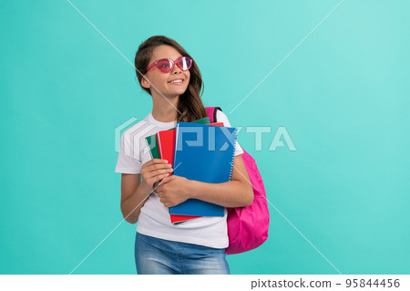 high school. happy teen girl carry backpack and notebook. back to school. knowledge day 95844456
