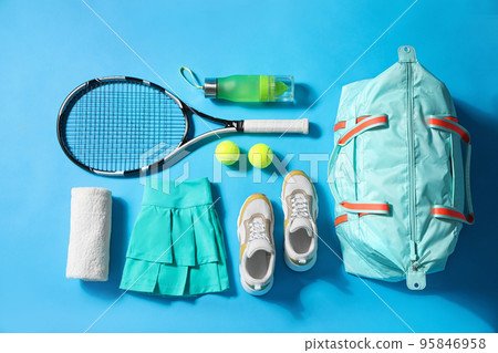 Flat lay composition with sports bag on light blue background 95846958